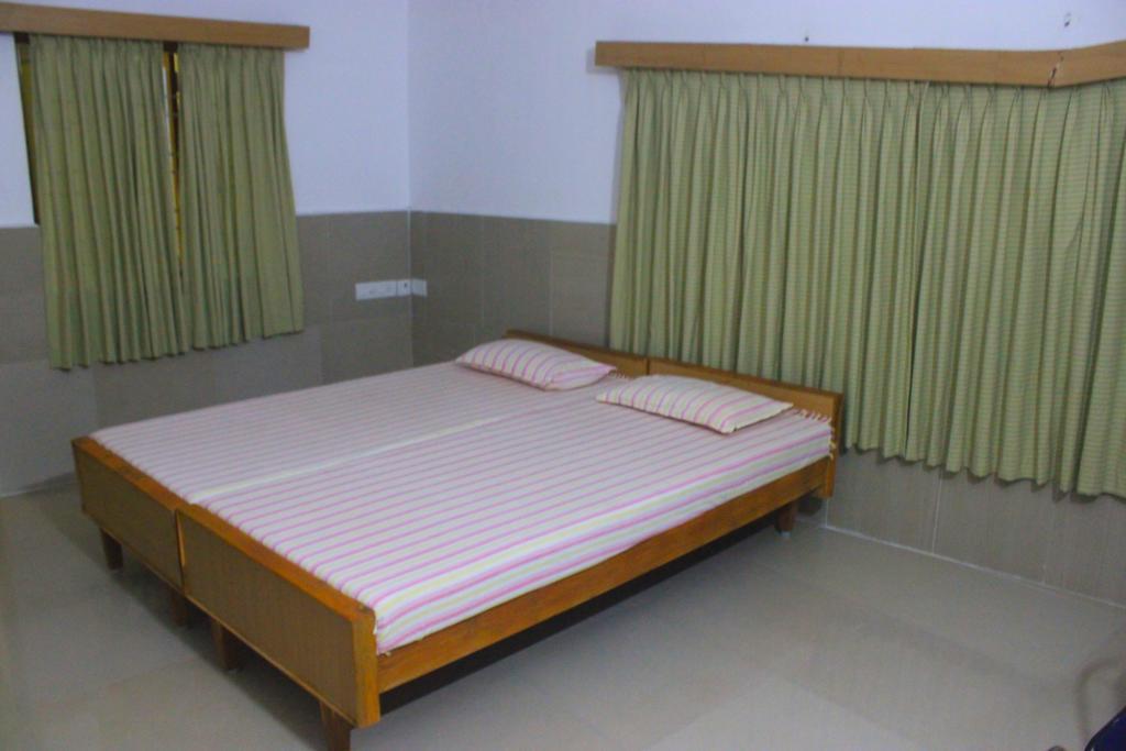 Vinodhara Guest House Махабалипурам Номер фото